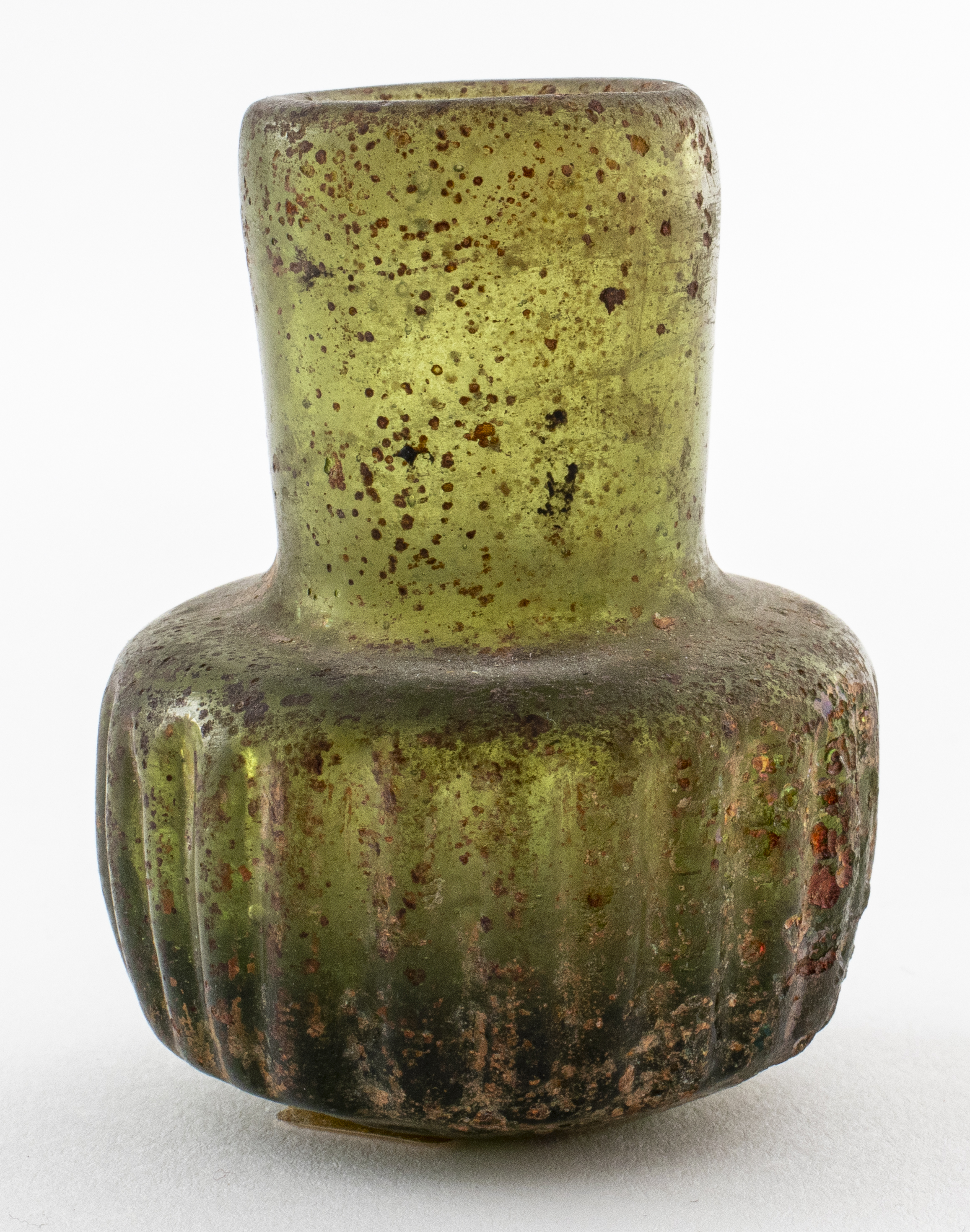 Appraisal: ANCIENT ROMAN RIBBED GREEN GLASS BOTTLE Ancient Roman green glass