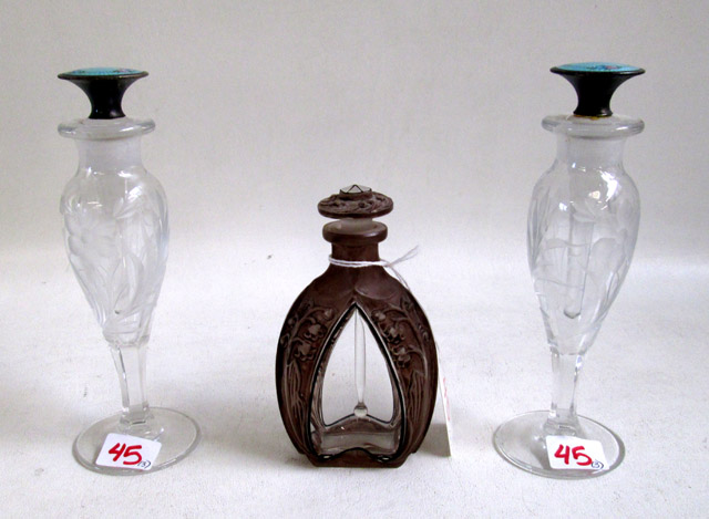 Appraisal: THREE FRAGRANCE BOTTLES the first marked Czechoslovakia having a lavender