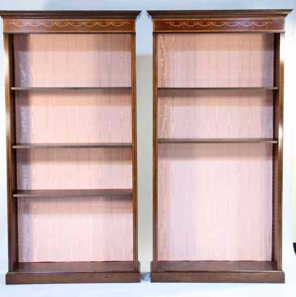 Appraisal: Pair of English Tall Bookcases th century mahogany dentil molding