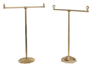 Appraisal: Two Brass Standing Towel Racks th century one twisted rope