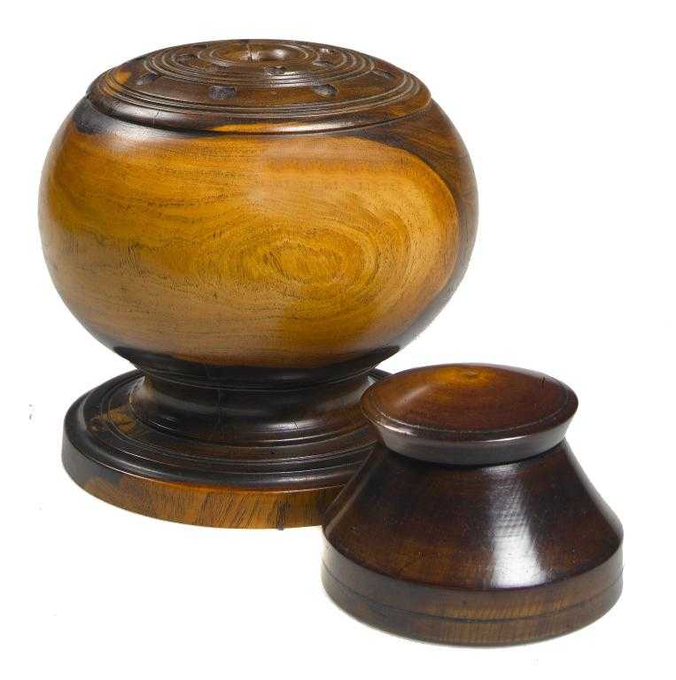 Appraisal: A LIGNUM VITAE QUILL STAND of bulbous form drilled with