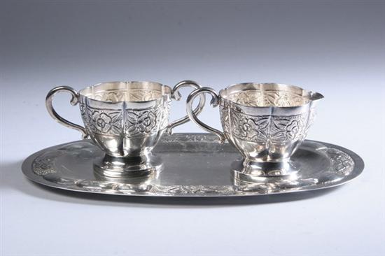 Appraisal: MEXICAN STERLING SILVER REPOUSS SUGAR CREAMER AND UNDERTRAY Sugar and