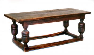 Appraisal: AN OAK REFECTORY TABLE th century the cleated plank top