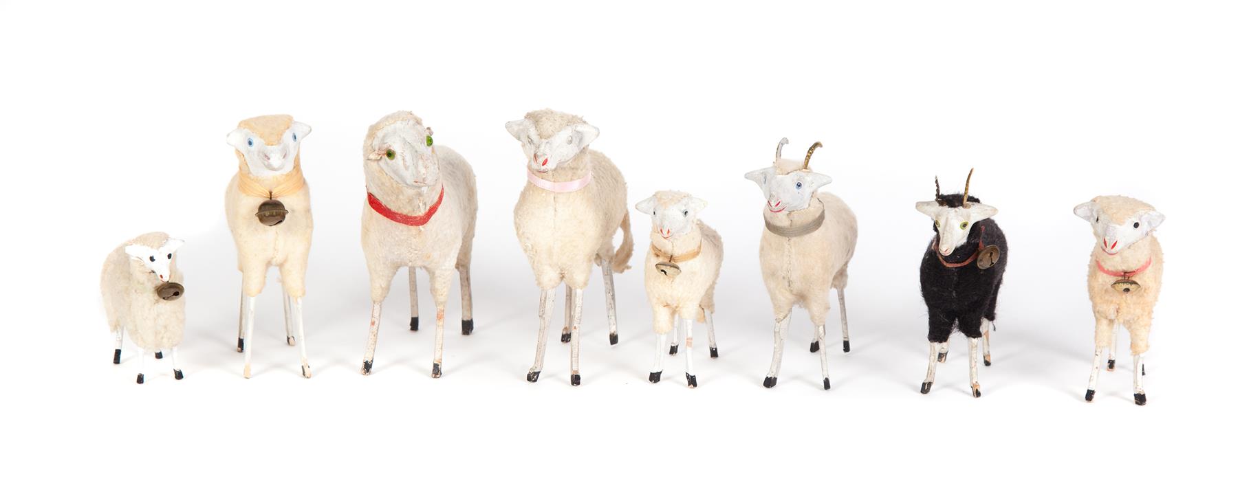 Appraisal: SIX WOOLLY STICK LEGGED NATIVITY SHEEP AND TWO RAMS Circa