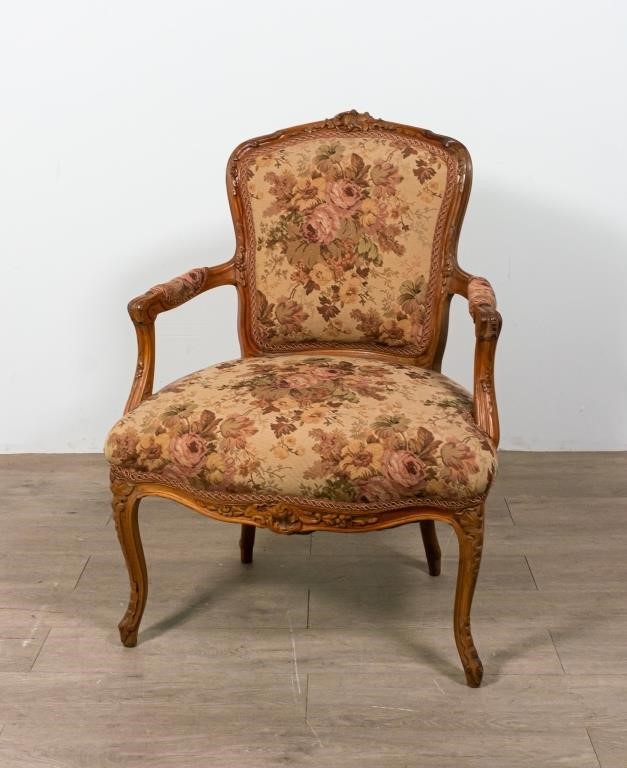 Appraisal: CARVED WALNUT UPHOLSTERED OPEN ARM CHAIRWalnut upholstered open arm chair