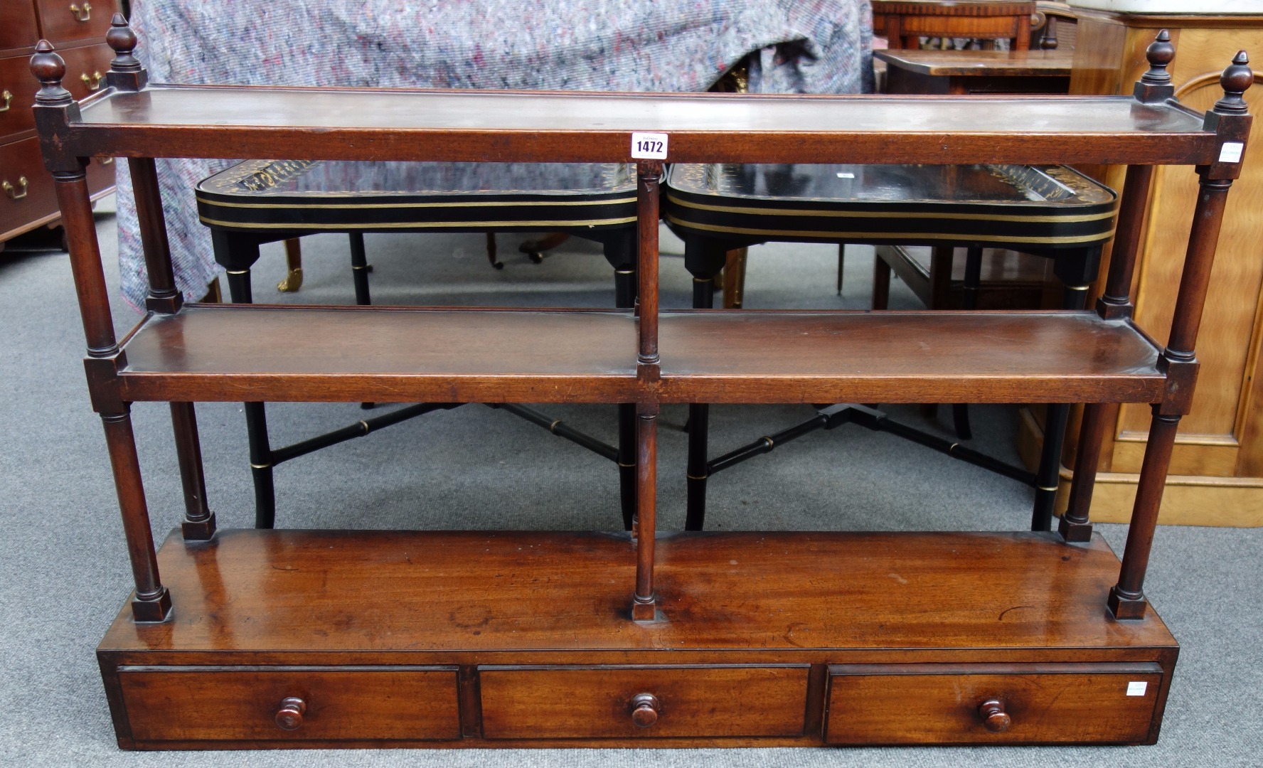 Appraisal: A th century mahogany wall shelf of three tiers the