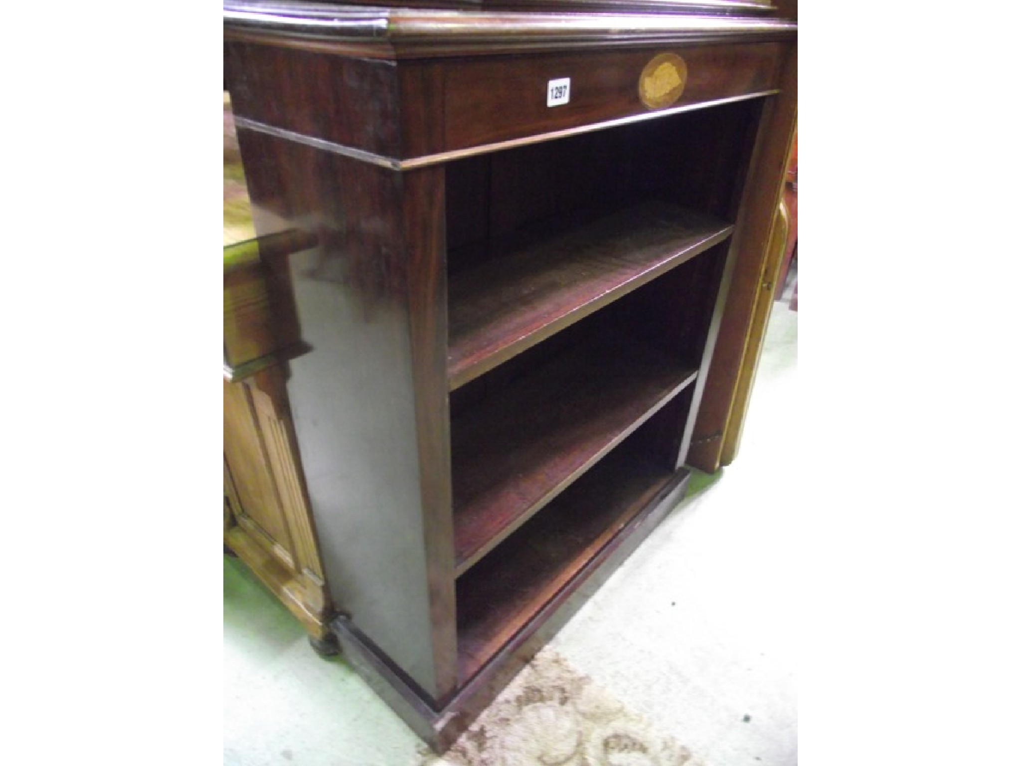 Appraisal: A small Georgian style freestandng open bookcase with shell inlaid