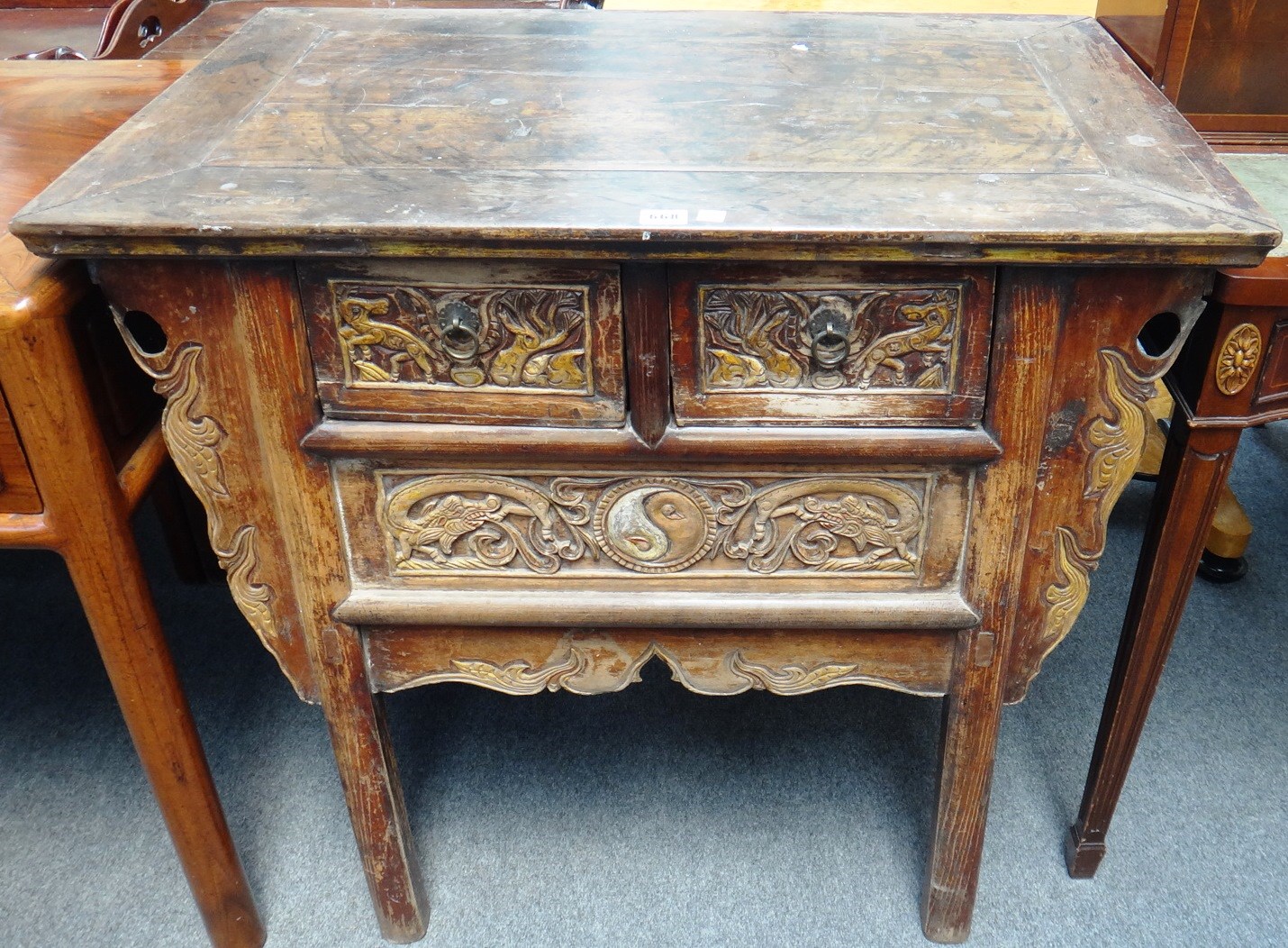 Appraisal: A late th century Chinese hardwood side cabinet with pair