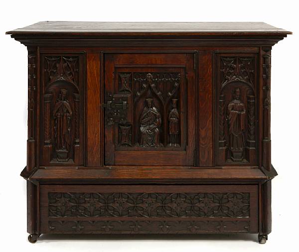 Appraisal: A Gothic Revival oak side cupboard height in width in