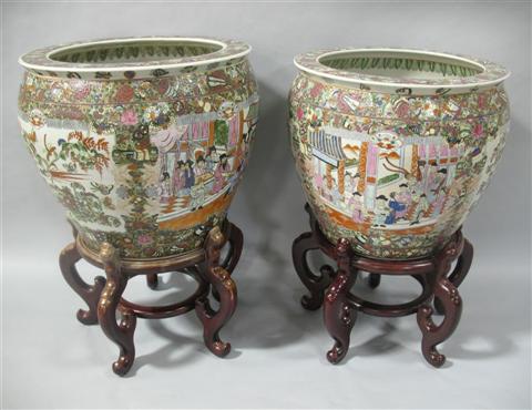 Appraisal: PAIR OF CHINESE FAMILLE ROSE JARDINIERES Of traditional globular shape