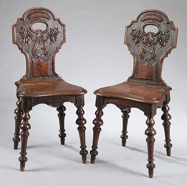 Appraisal: A Pair of American Renaissance Carved Oak Hall Chairs late