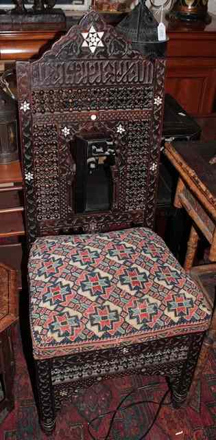 Appraisal: A MIDDLE EASTERN CARVED WOODEN CHAIR with mother of pearl