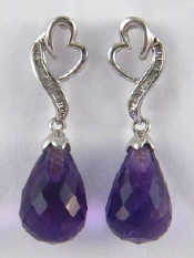 Appraisal: A pair of white metal tests carat gold amethyst and