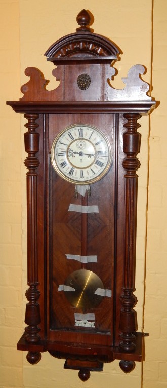 Appraisal: A Gustav Becker Vienna wall clock in a walnut case