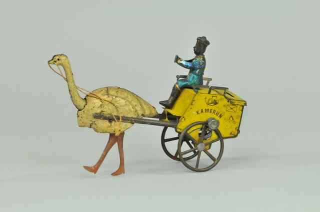 Appraisal: LEHMANN ''KAMERUN'' OSTRICH CART Germany hand-painted and lithographed tin seated