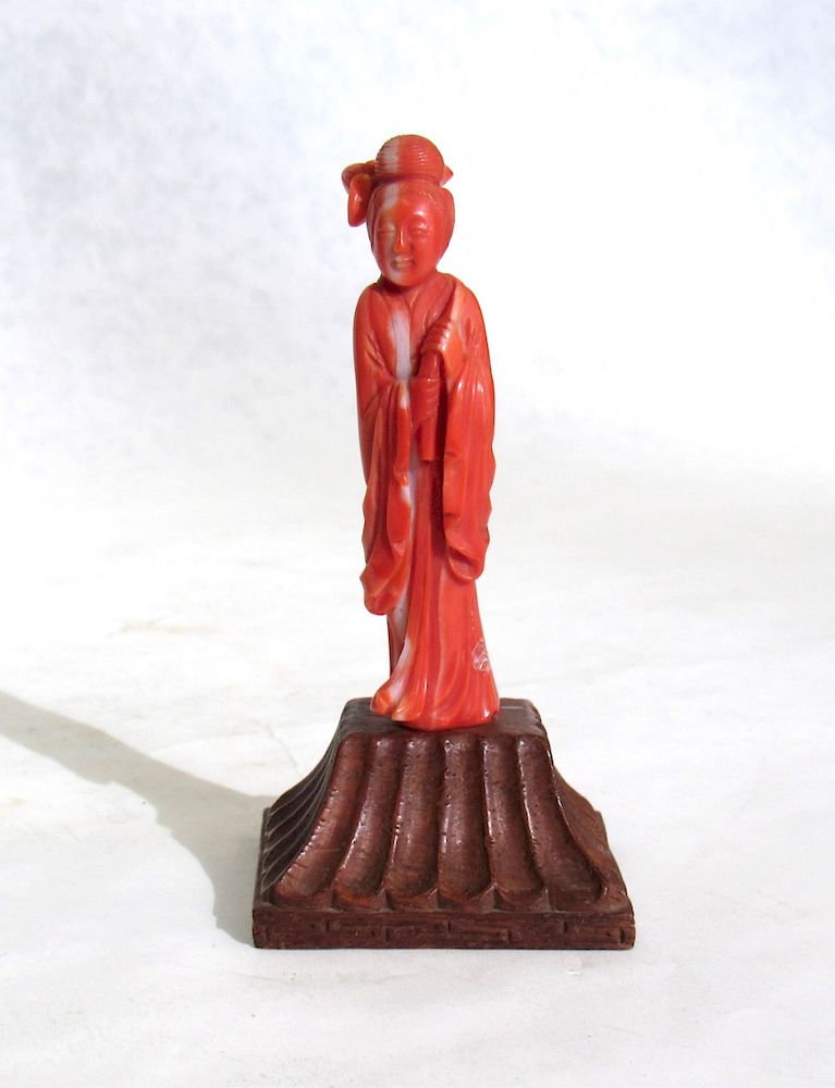 Appraisal: Small Coral Carving of Guanyin The delicately carved figure with