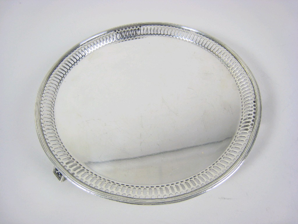 Appraisal: A George V pierced circular Salver with reeded and pierced