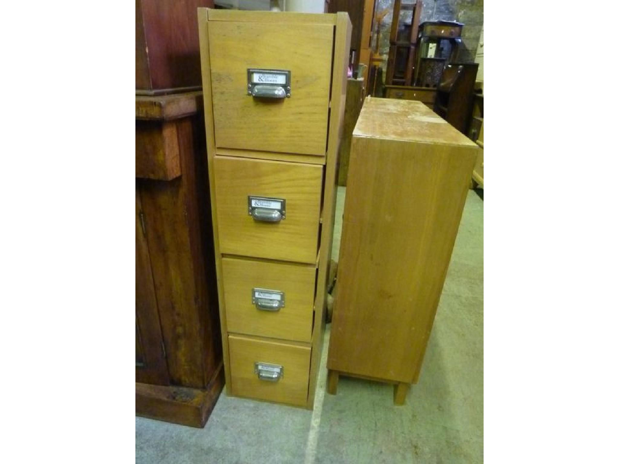 Appraisal: A modern beech wood upright four drawer chest in the