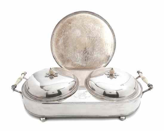 Appraisal: An English Silverplate Two-Part Warming Stand each covered entree having