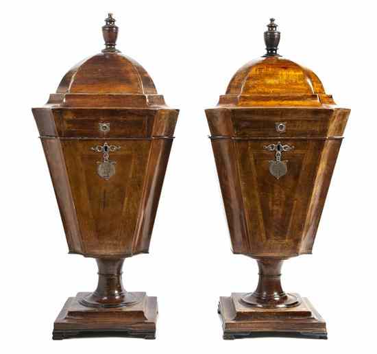 Appraisal: A Pair of English Mahogany Cutlery Urns having an urn