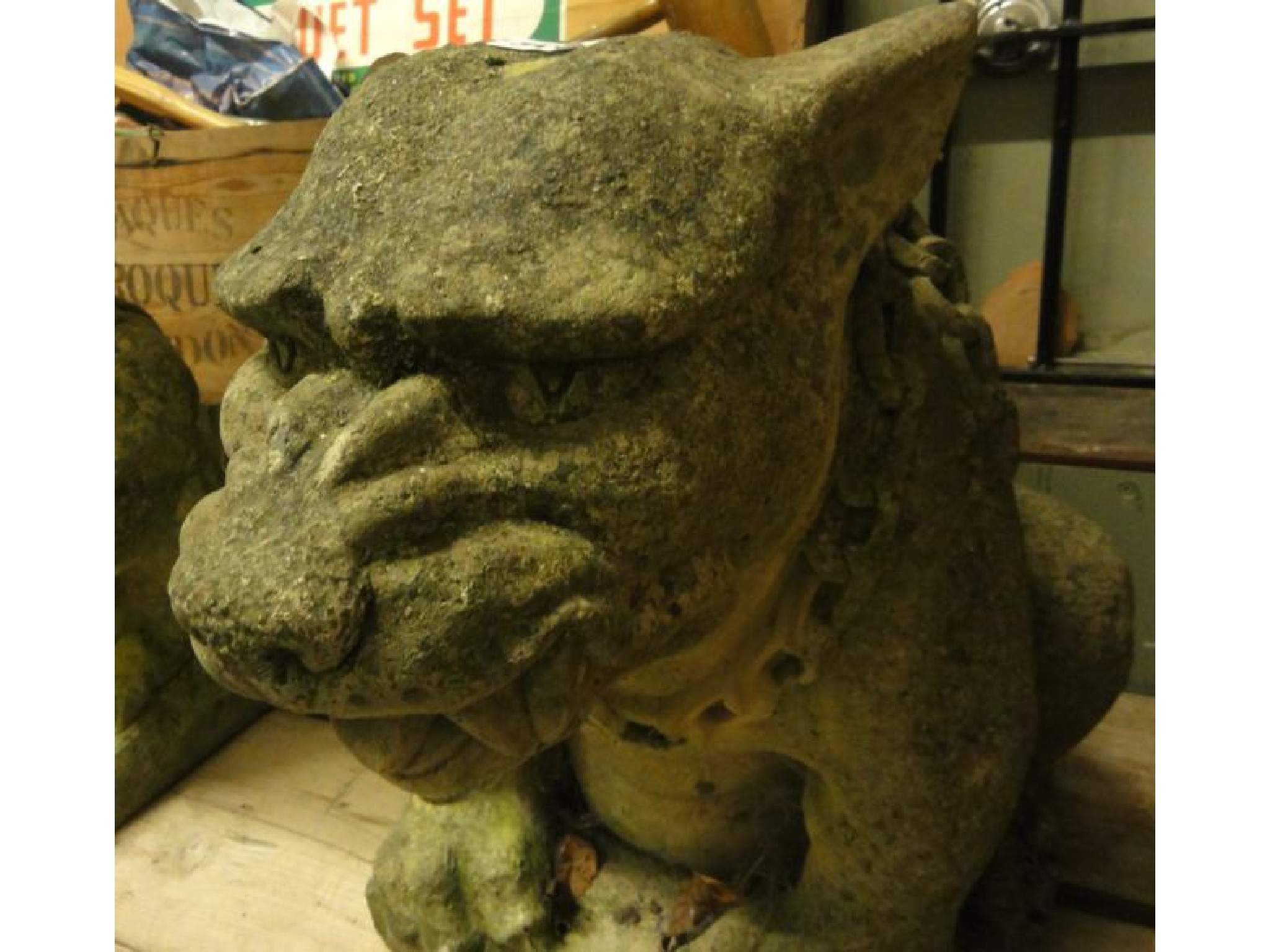 Appraisal: A good quality contemporary weathered cast composition stone gargoyle in