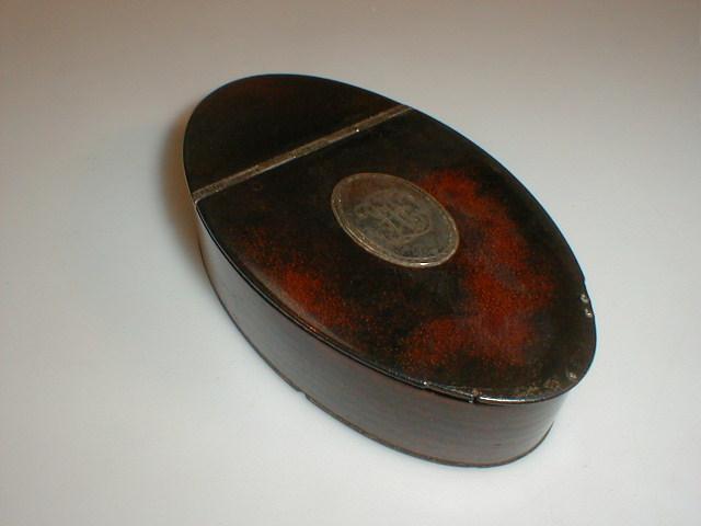 Appraisal: Georgian oval leather snuff box the hinged lid inset with