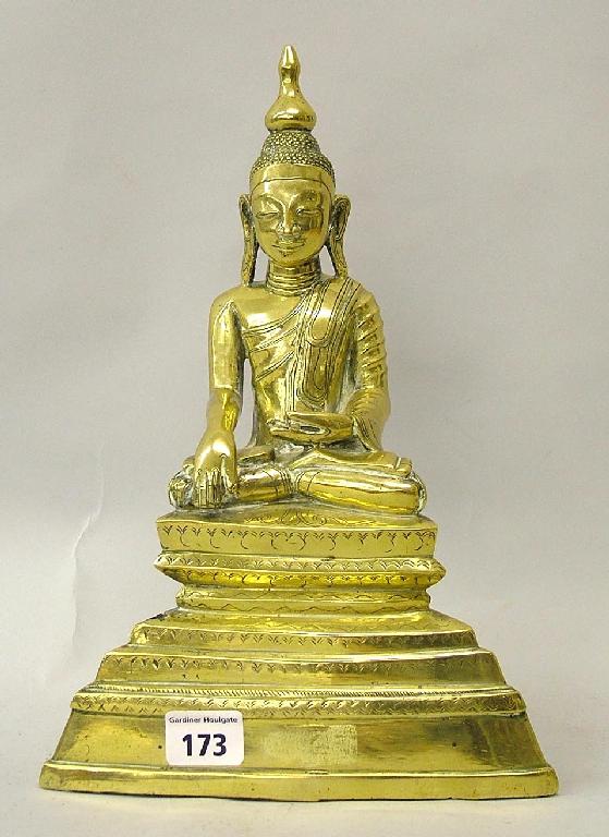 Appraisal: Antique Oriental brass figurine of a cross legged Immortal upon