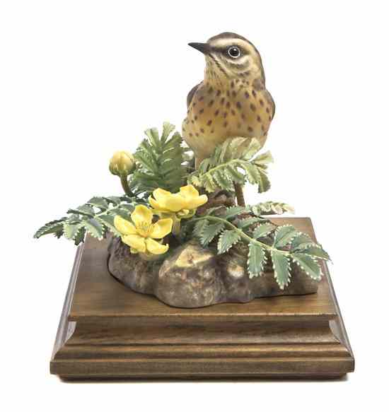 Appraisal: A Royal Worcester Dorothy Doughty Bird Meadow Pipit perched on