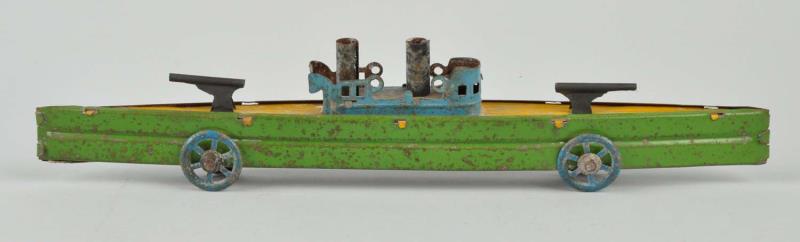 Appraisal: Fischer German Gunboat Penny Toy This penny toy has moderate