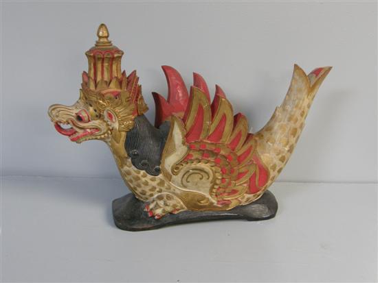 Appraisal: Carved and painted Sumatran dragonbird th century painted in red