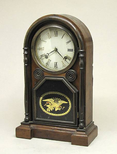 Appraisal: An American rosewood mantel clock inset with eglomis glass panel