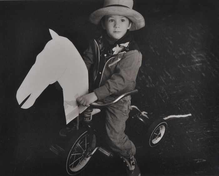 Appraisal: JED DEVINE b JESSE ON A TRICYCLE Platinum palladium print