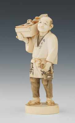 Appraisal: A Carved Ivory Japanese Figure of a Carpenter Fully carved