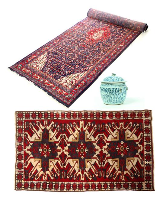 Appraisal: TWO ORIENTAL RUGS AND A GINGER JAR Twentieth century Jar