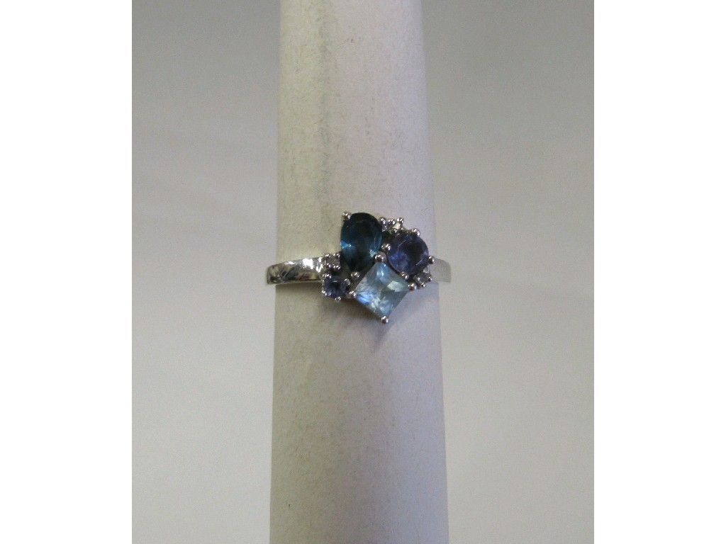 Appraisal: Nine carat white gold blue topaz amethyst and diamond set