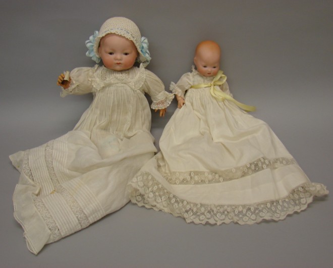 Appraisal: Pair of solid dome babies L cir AM Germany K