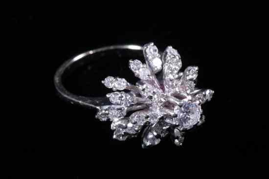 Appraisal: WHITE GOLD AND DIAMOND ''PINEAPPLE '' STYLE RING Brilliant-cut round