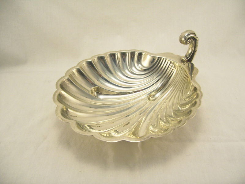 Appraisal: International Sterling Shell Dish Handled shell dish marked International sterling