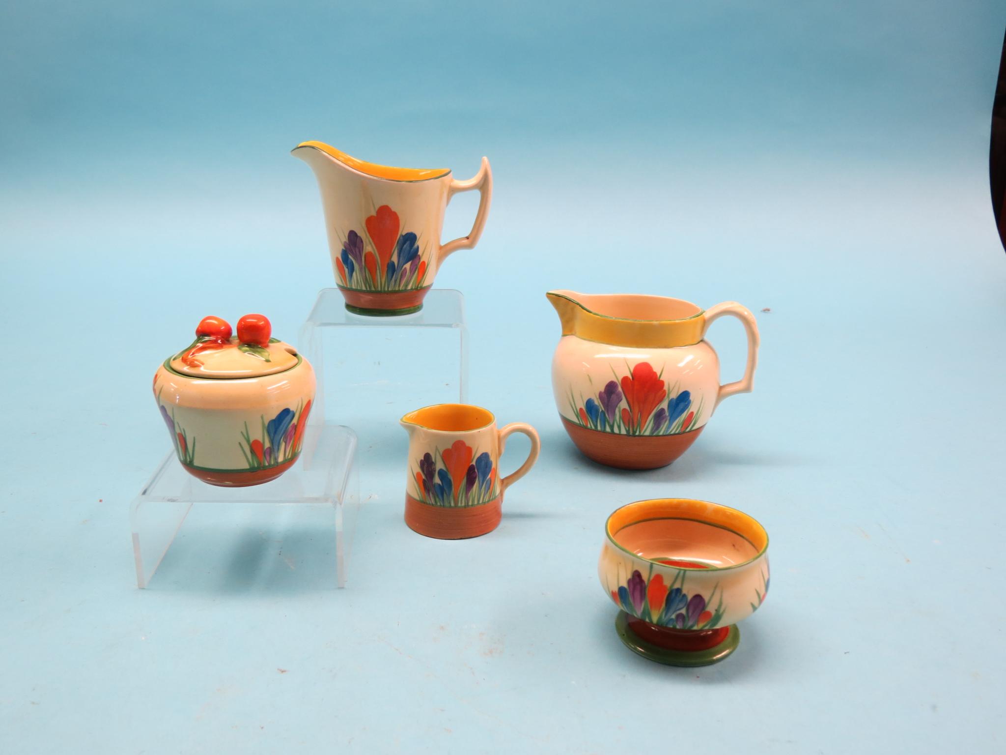 Appraisal: Clarice Cliff Crocus two jugs covered mustard pot small bowl