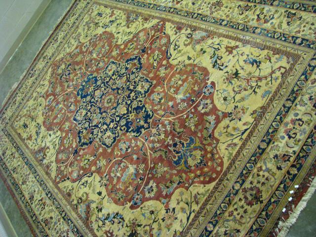 Appraisal: x traditional Persian design rug with floral border and accents