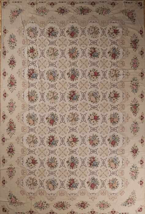 Appraisal: NEEDLEWORK CARPET The ivory field worked with floral tiles within