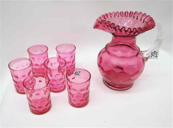 Appraisal: SEVEN PIECES OF AMERICAN CRANBERRY GLASS pitcher with pinched and