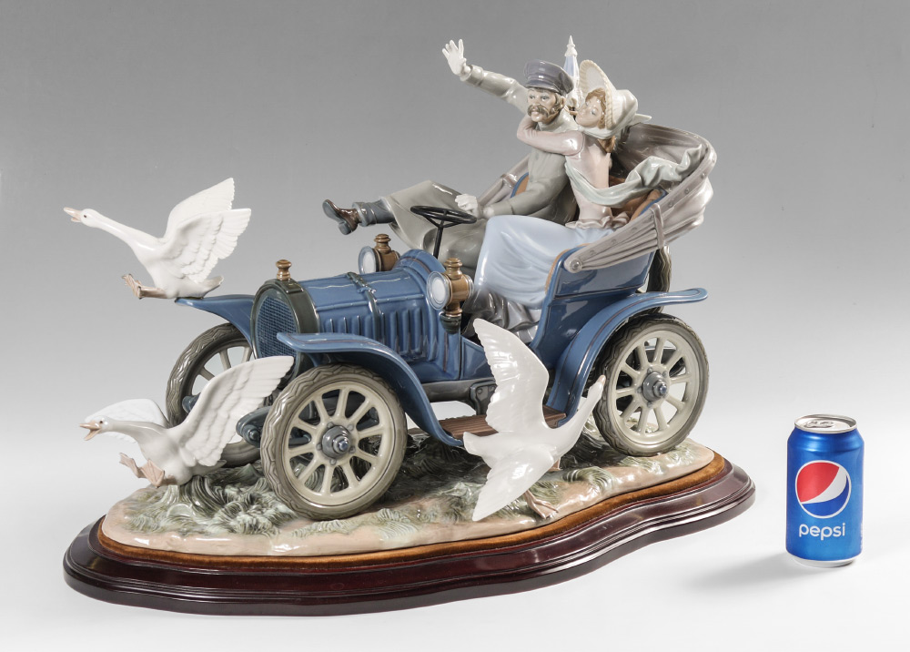 Appraisal: LLADRO PORCELAIN LIMITED EDITION FIGURAL GROUPING ''CAR IN TROUBLE'' Salvador