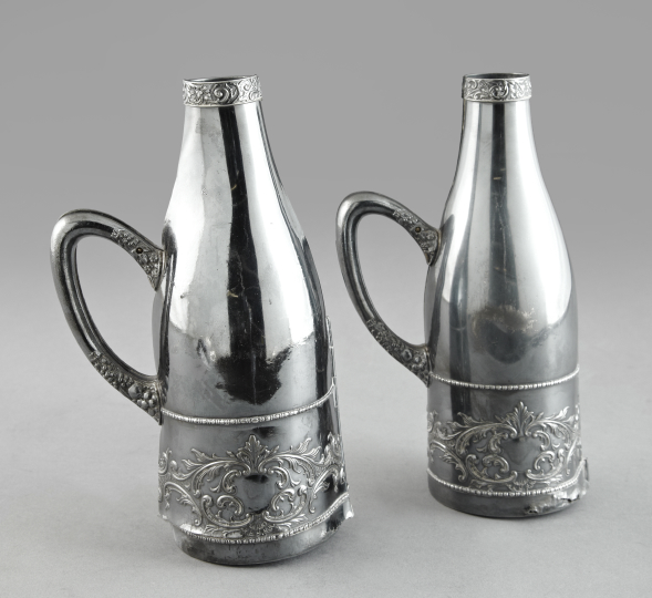 Appraisal: Rare Pair of Meriden Silverplate Bi-Fold Wine Bottle Sleeves fourth