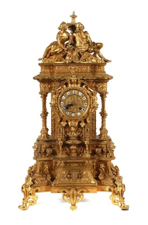 Appraisal: Figural cast gilt Berrolla French mantel clock Porcelain hour tiles