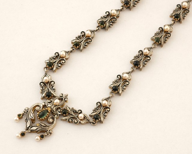 Appraisal: A Continental silver pearl and tourmaline necklace Having a central