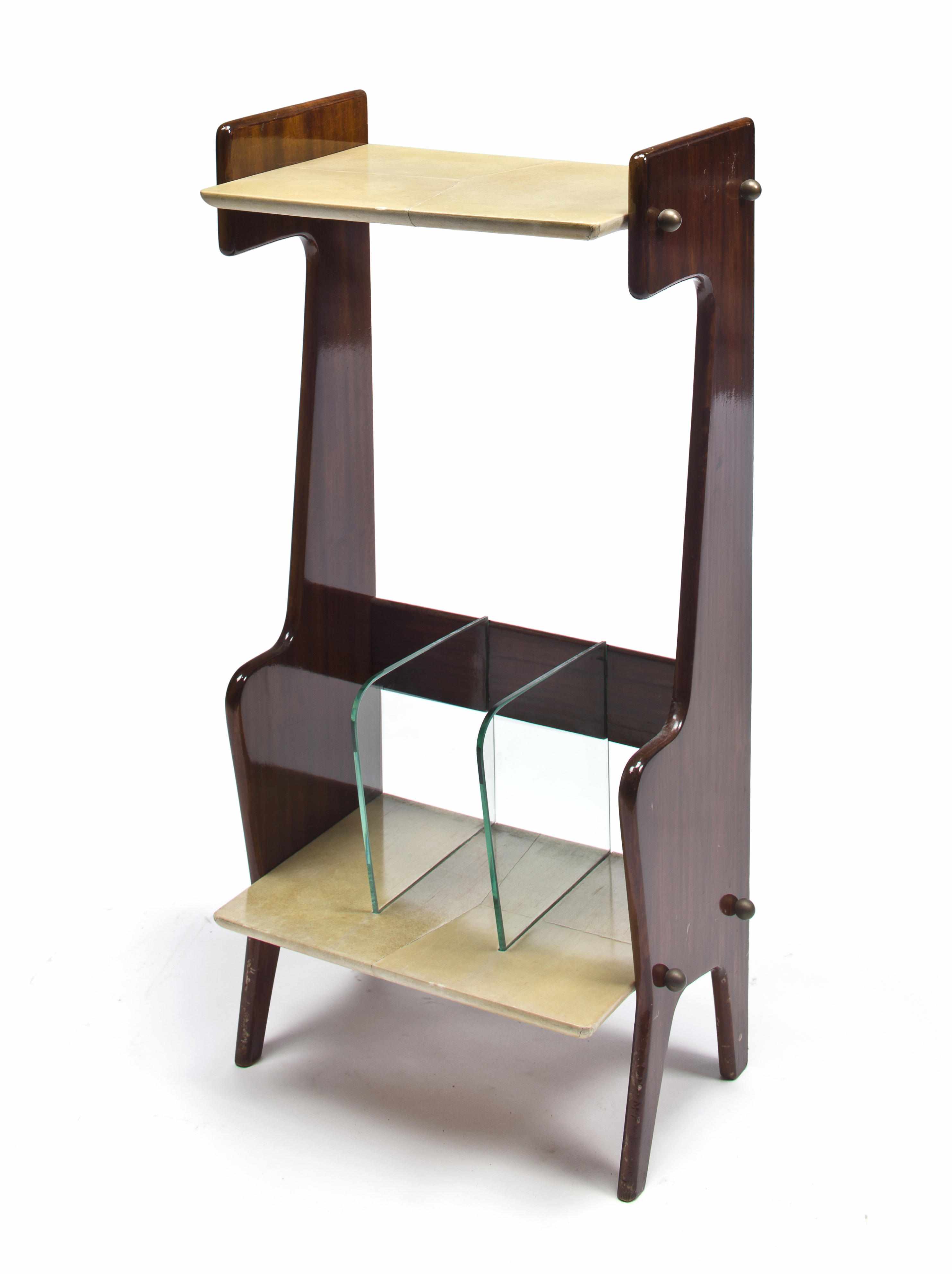 Appraisal: An Aldo Tura mahogany parchment and glass magazine stand circa