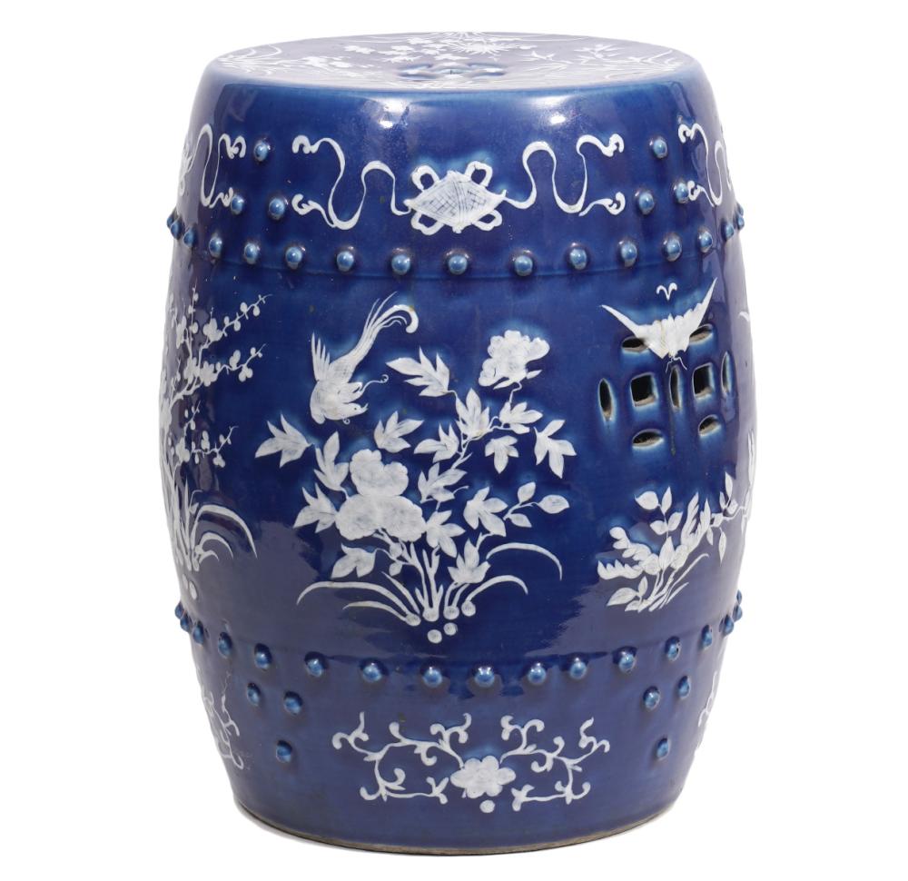 Appraisal: CHINESE BLUE WHITE PORCELAIN GARDEN SEATChinese porcelain raised white slip-decorated