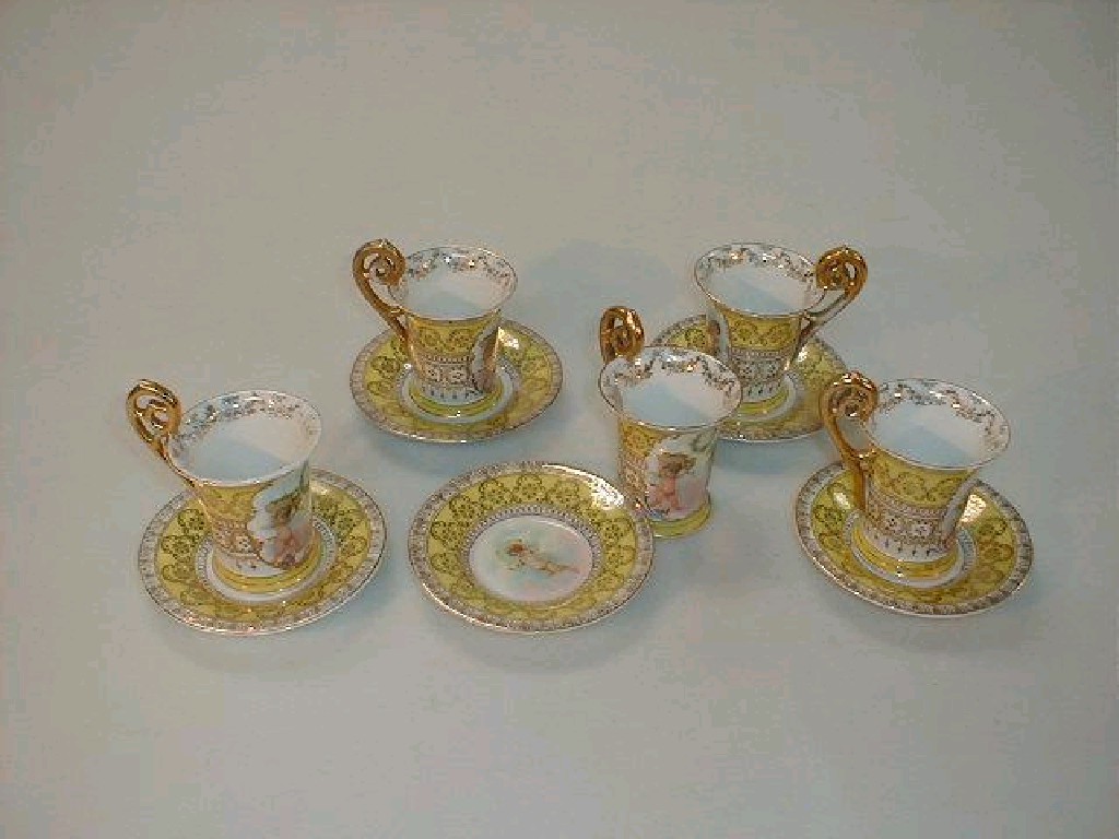 Appraisal: A set of five Continental porcelain trembleuse cups and saucers