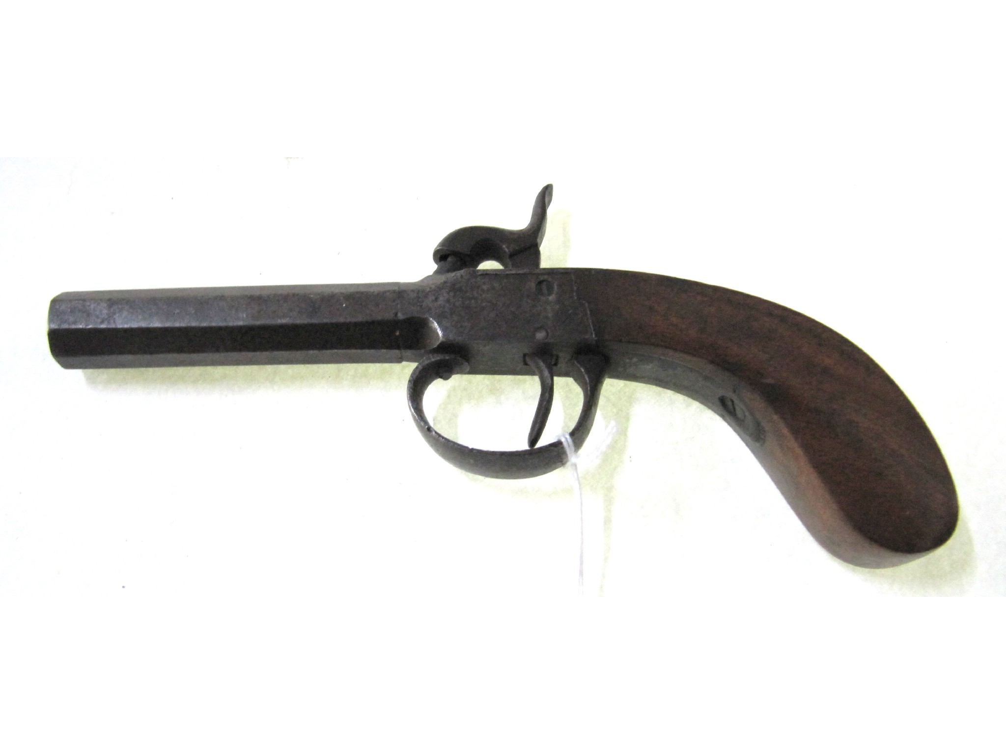 Appraisal: A percussion cap pocket pistol with octagonal barrel and walnut